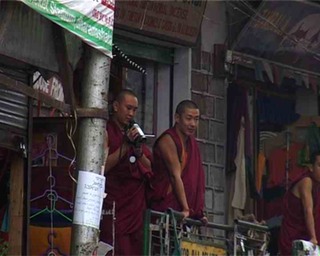 Monks with camcorder in Dharamsala